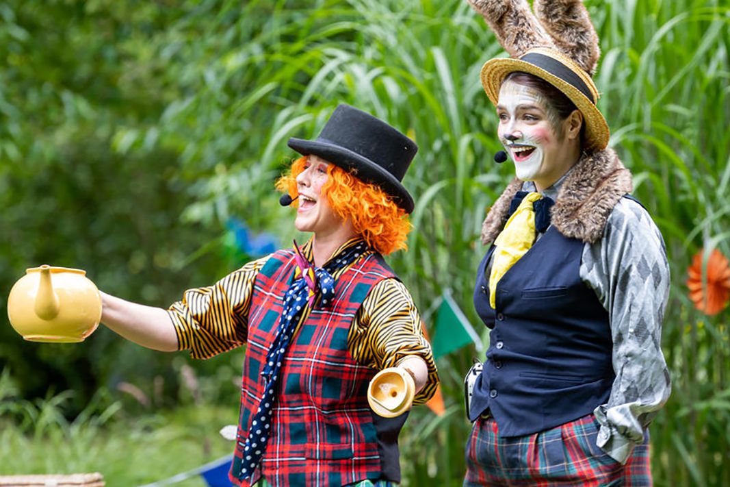 Actors dress as a hatter and a hare