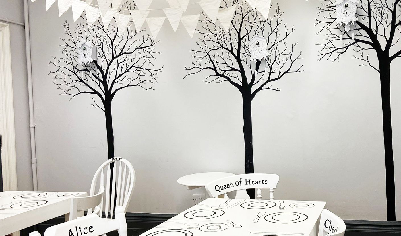Black and white room decorated with white bunting