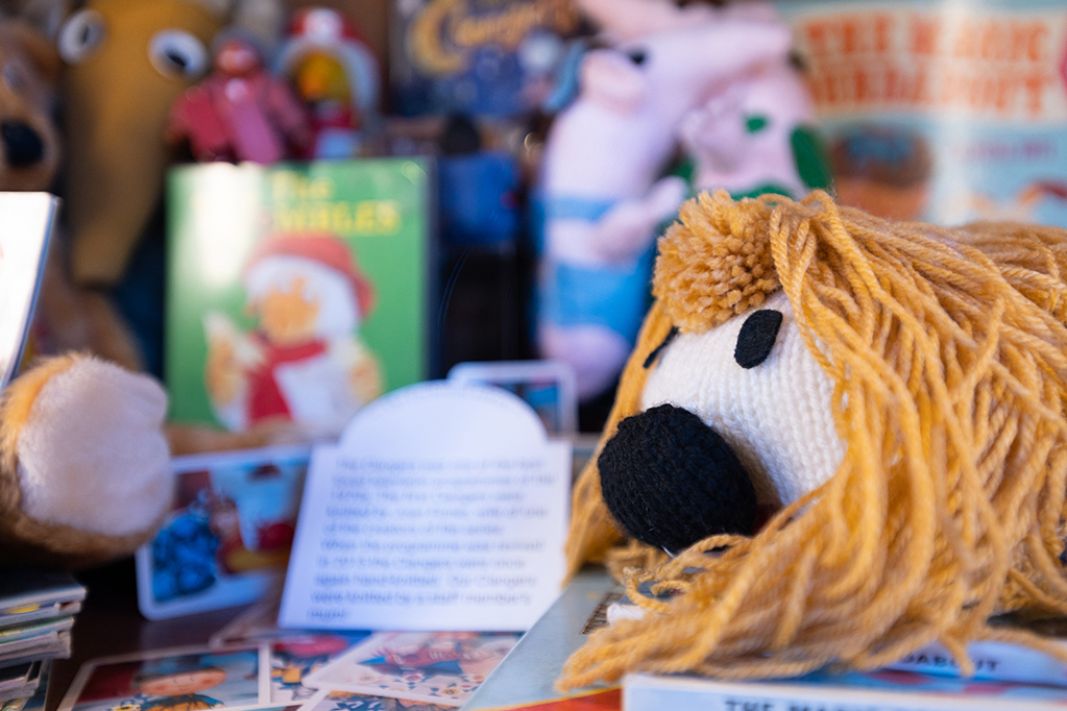 Children's toys in a display case.