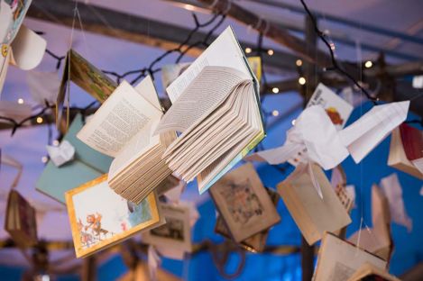 Open books hanging from the ceiling